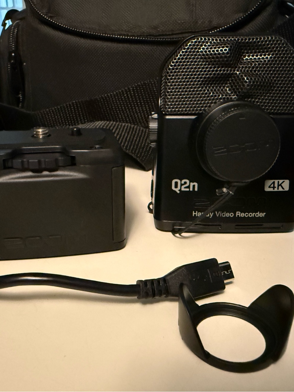 Zoom Q2n 4K Handy Video Recorder w/ tripod, bag, and extra battery pack case.